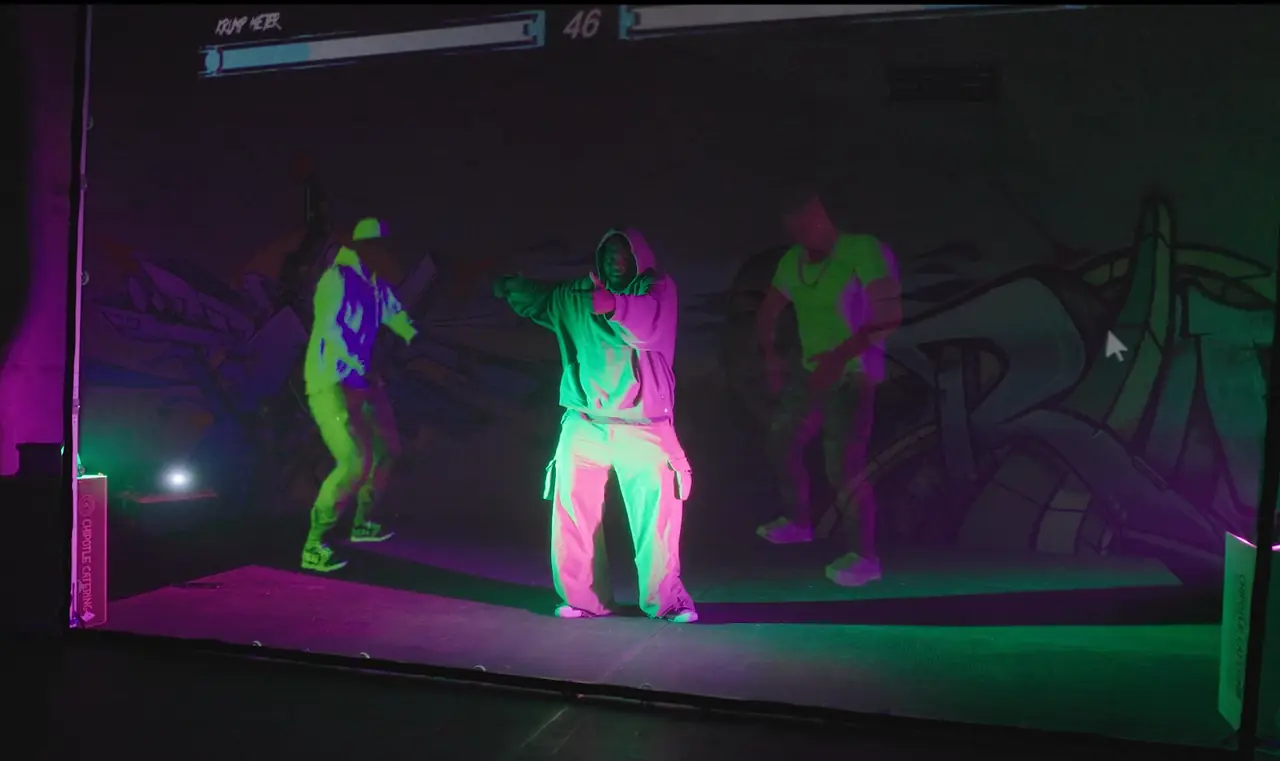 DreaMR Labs Krump Battle augmented reality live show — dancer performing with motion-captured avatars on a neon-lit stage